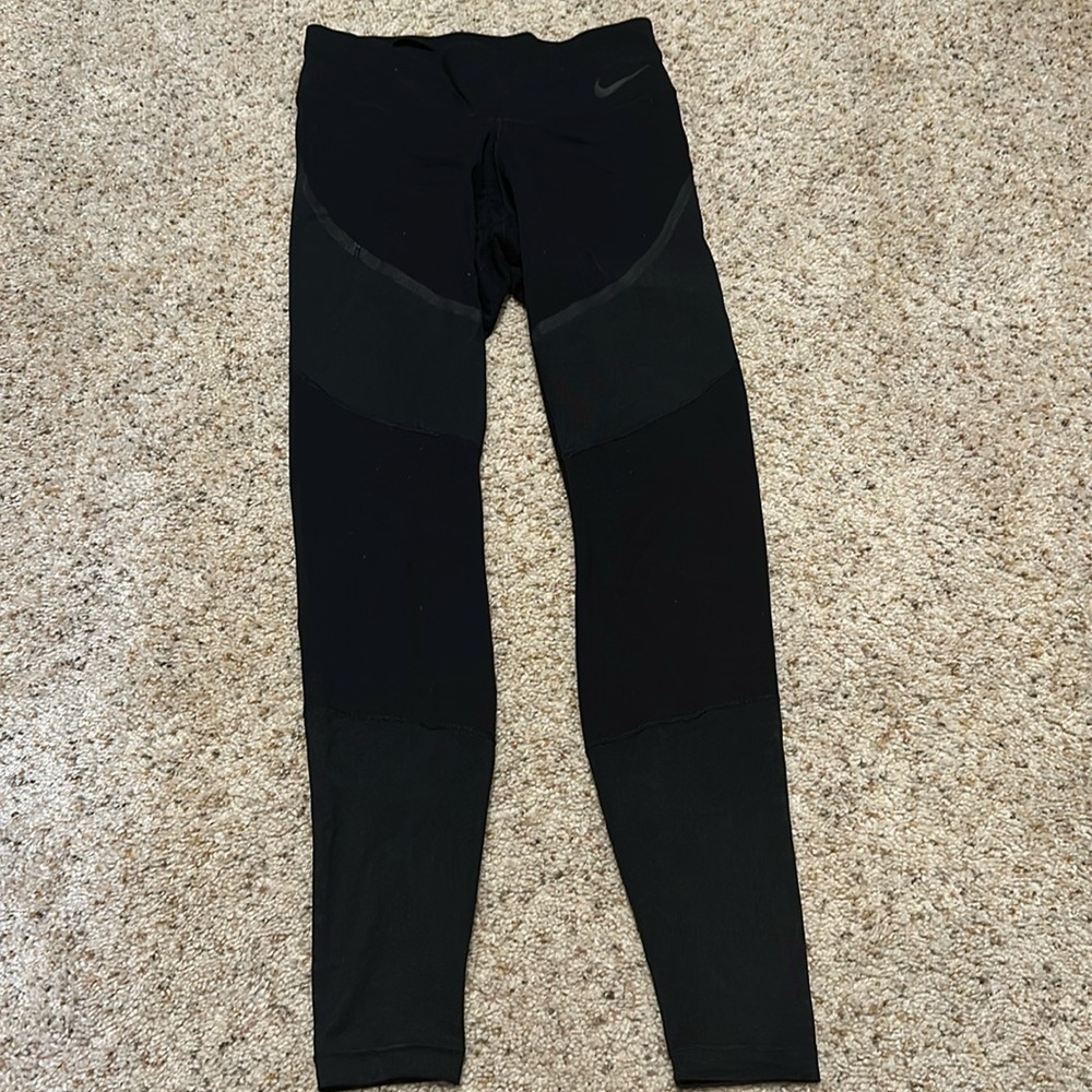Nike black dri fit leggings with mesh bottoms size S